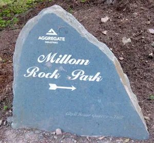 Slab of rock sticking out of the ground ready 'millom rock park'